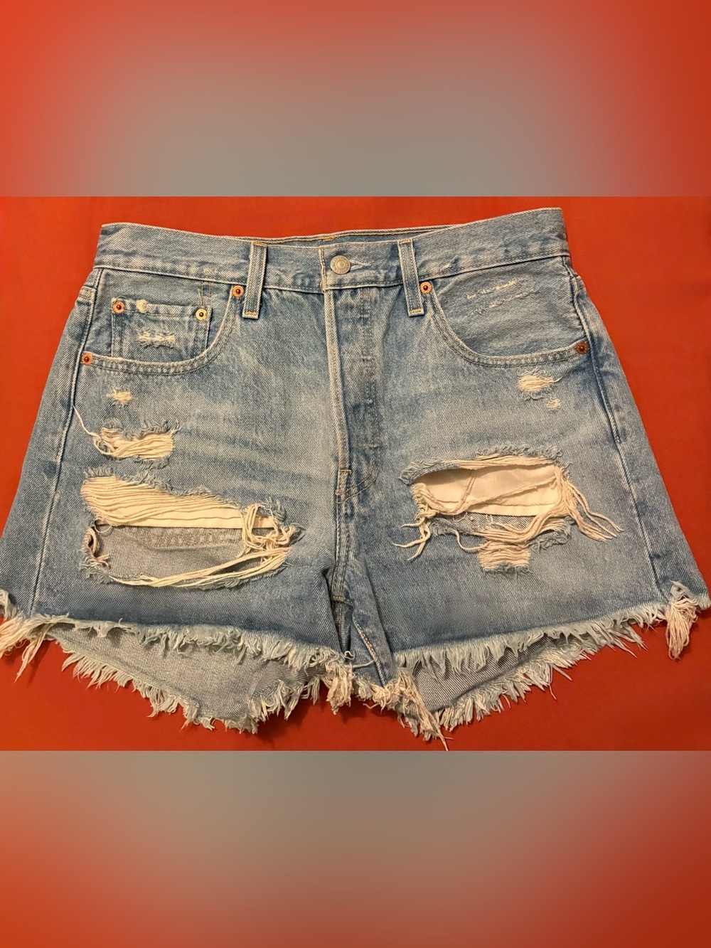 Levi’s Premium 501 High-Rise Distressed Light Blue Denim Cutoff Shorts